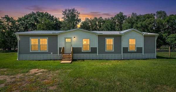 3 Acres of Land with Home for Sale in Weirsdale, Florida