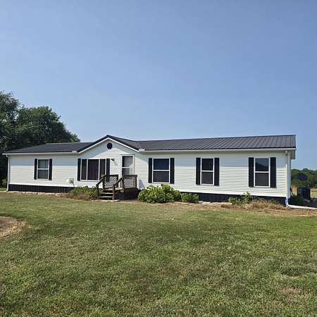 15.4 Acres of Land with Home for Sale in Aurora, Missouri