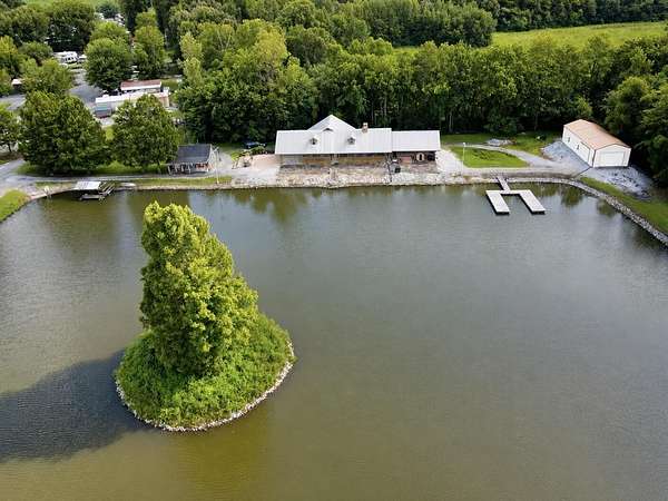 23.3 Acres of Recreational Land with Home for Sale in Calvert City, Kentucky