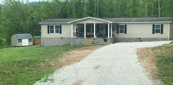 25 Acres of Land with Home for Sale in Hagerhill, Kentucky