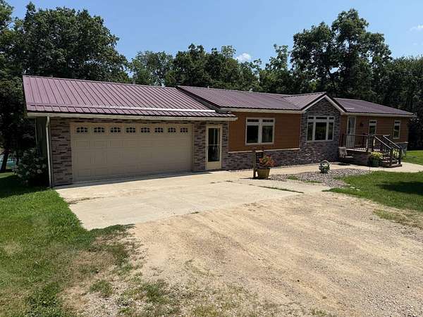 21.3 Acres of Recreational Land with Home for Sale in Waterville, Iowa