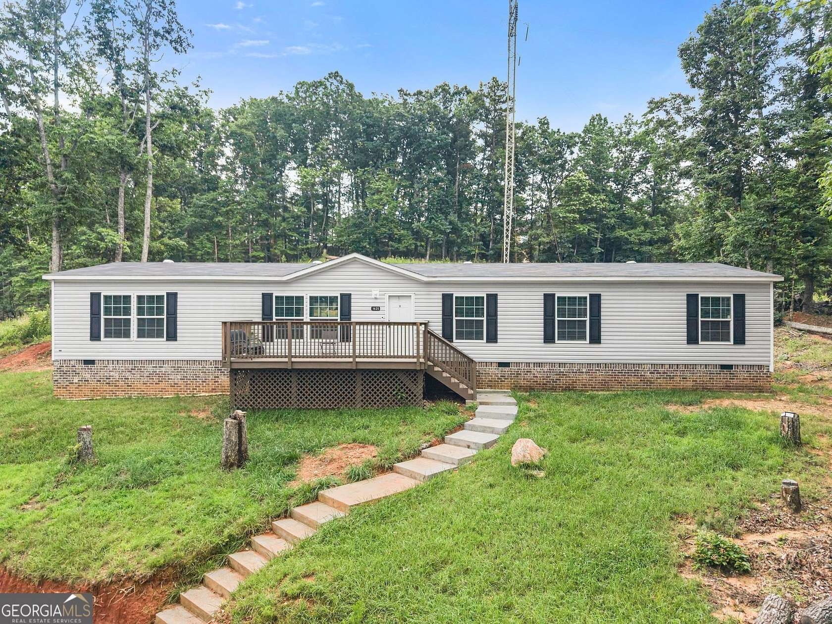 2.57 Acres of Land with Home for Sale in Cleveland, Georgia