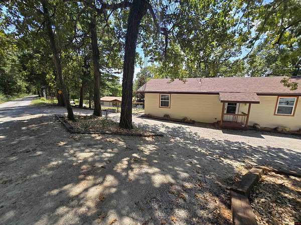 7 Acres of Land with Home for Sale in Mountain Home, Arkansas