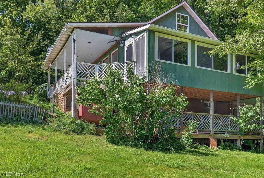 2 Acres of Land with Home for Sale in Rogers, Ohio