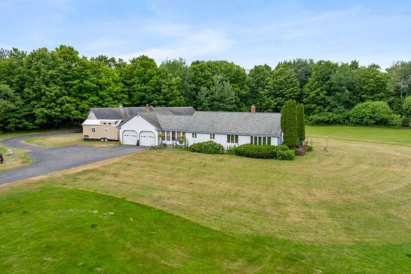 6.48 Acres of Land with Home for Sale in Pownal Town, Maine