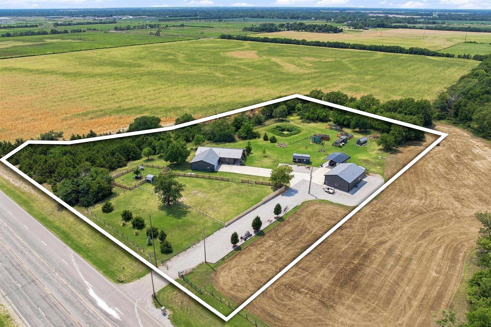 5 Acres of Land with Home for Sale in Park City, Kansas