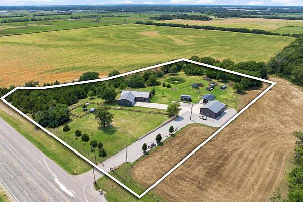 5 Acres of Land with Home for Sale in Park City, Kansas