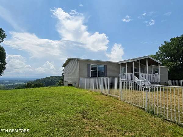 39.7 Acres of Recreational Land with Home for Sale in Sweetwater, Tennessee