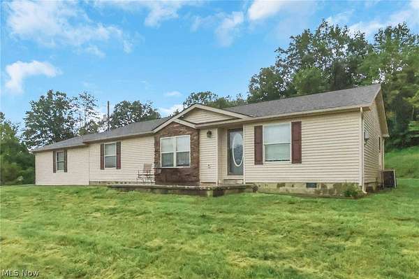 5 Acres of Land with Home for Sale in Cumberland, Ohio