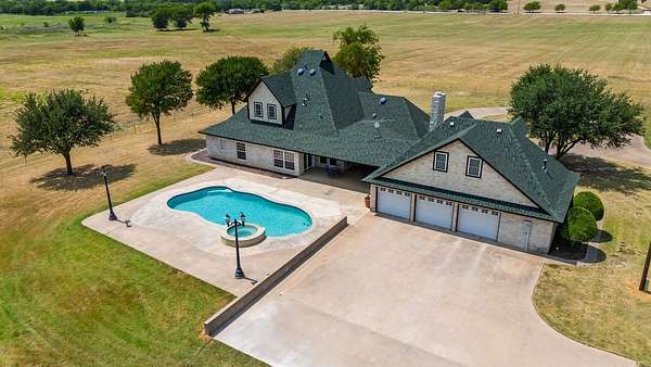 10 Acres of Land with Home for Sale in Whitney, Texas