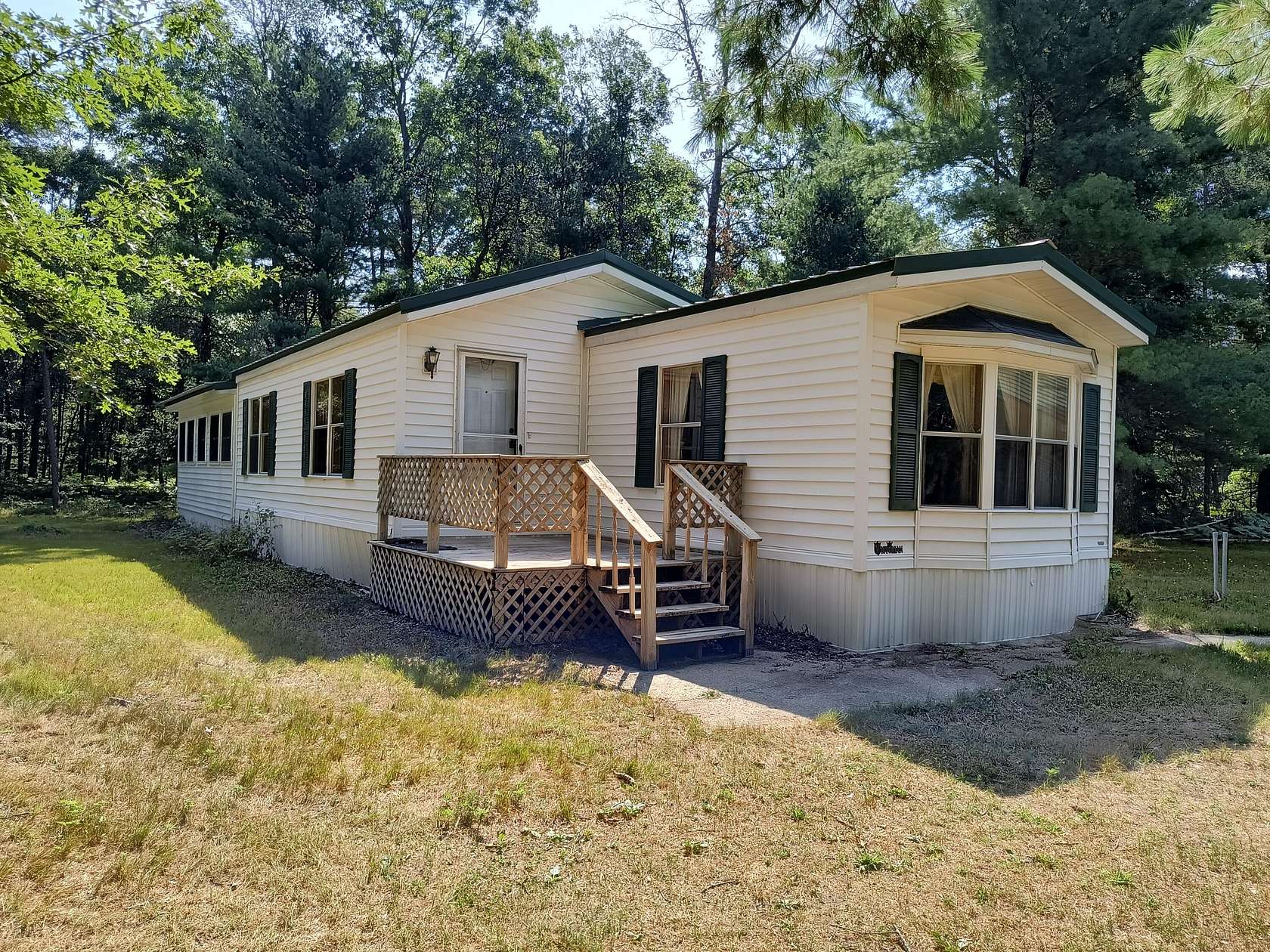 6 Acres of Land with Home for Sale in Baldwin, Michigan