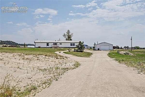 5 Acres of Land with Home for Sale in Peyton, Colorado