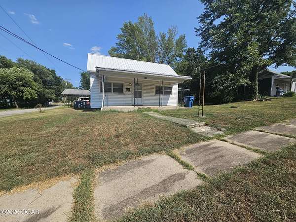 0.32 Acres of Land with Home for Sale in Carterville, Missouri