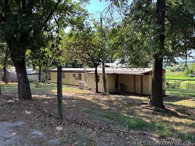 10 Acres of Land with Home for Sale in Okmulgee, Oklahoma