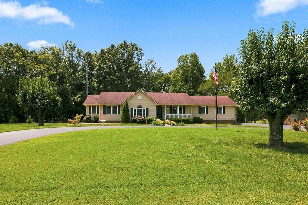 11.3 Acres of Recreational Land with Home for Sale in Paris, Tennessee