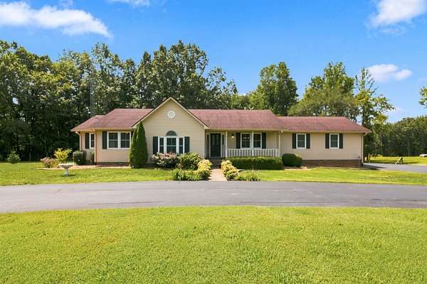 11.3 Acres of Land with Home for Sale in Paris, Tennessee