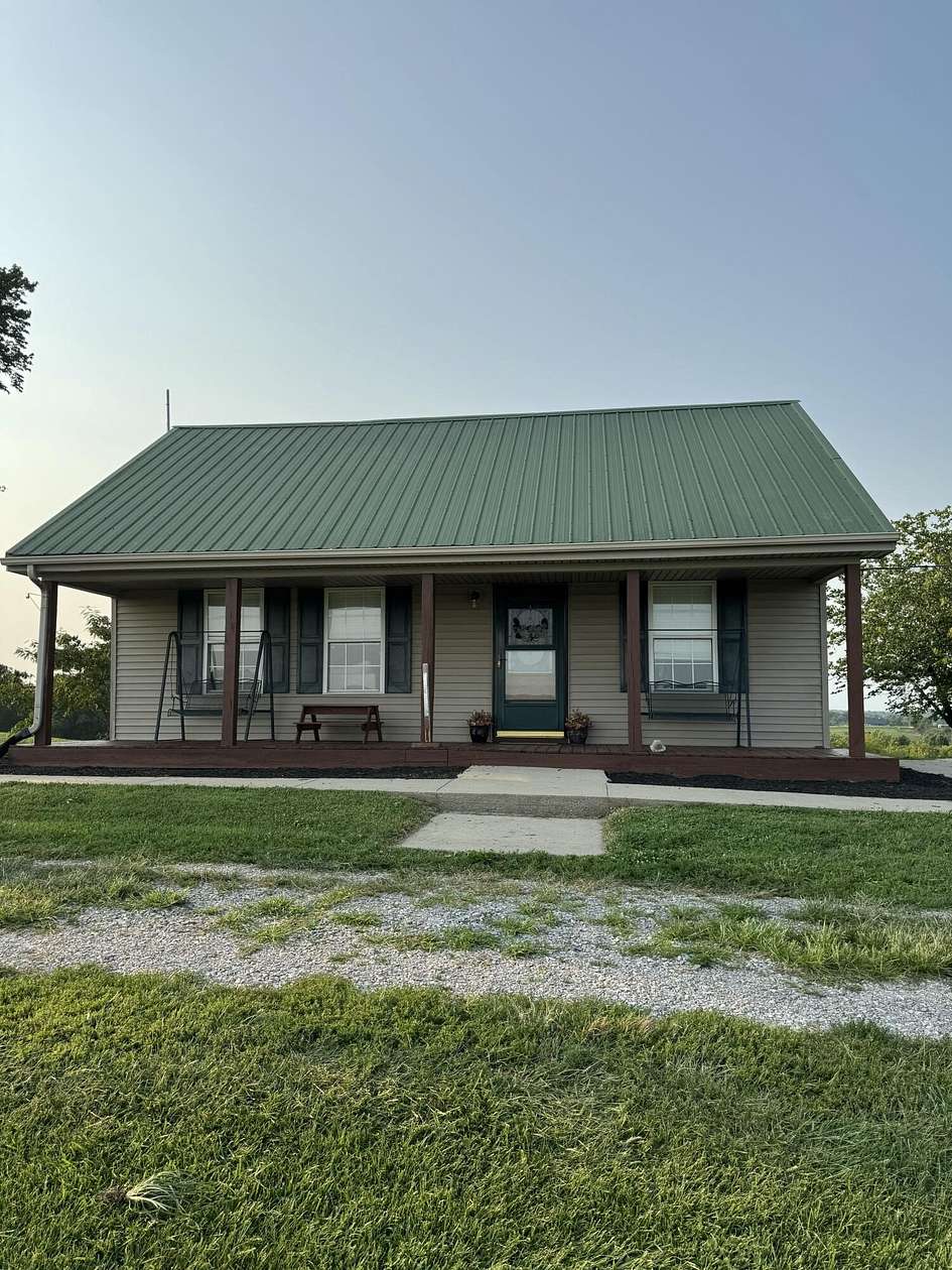 14 Acres of Land with Home for Sale in Lawrenceburg, Kentucky