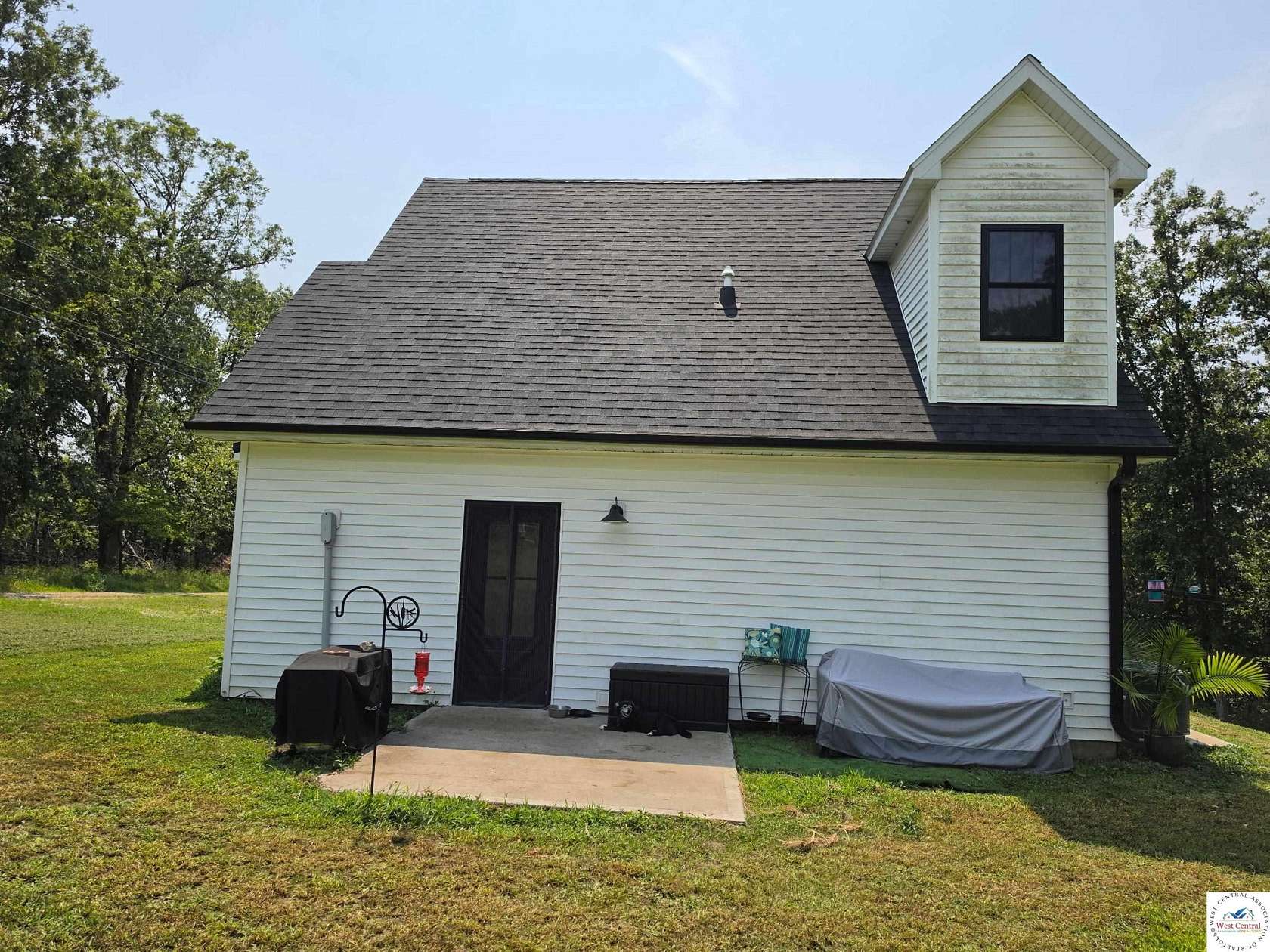 9.72 Acres of Land with Home for Sale in Versailles, Missouri