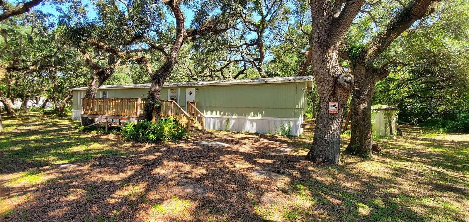 1.69 Acres of Land with Home for Sale in Hudson, Florida