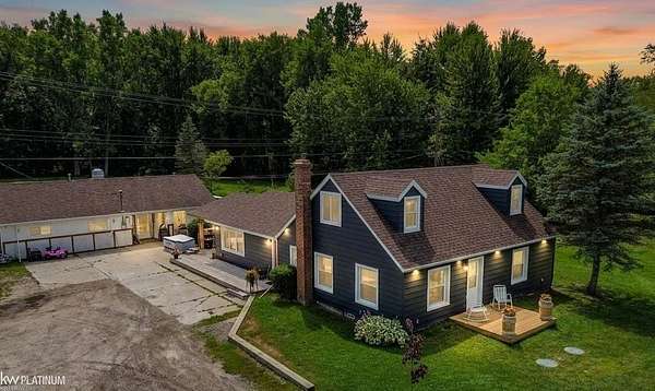 1.5 Acres of Land with Home for Sale in Casco, Michigan