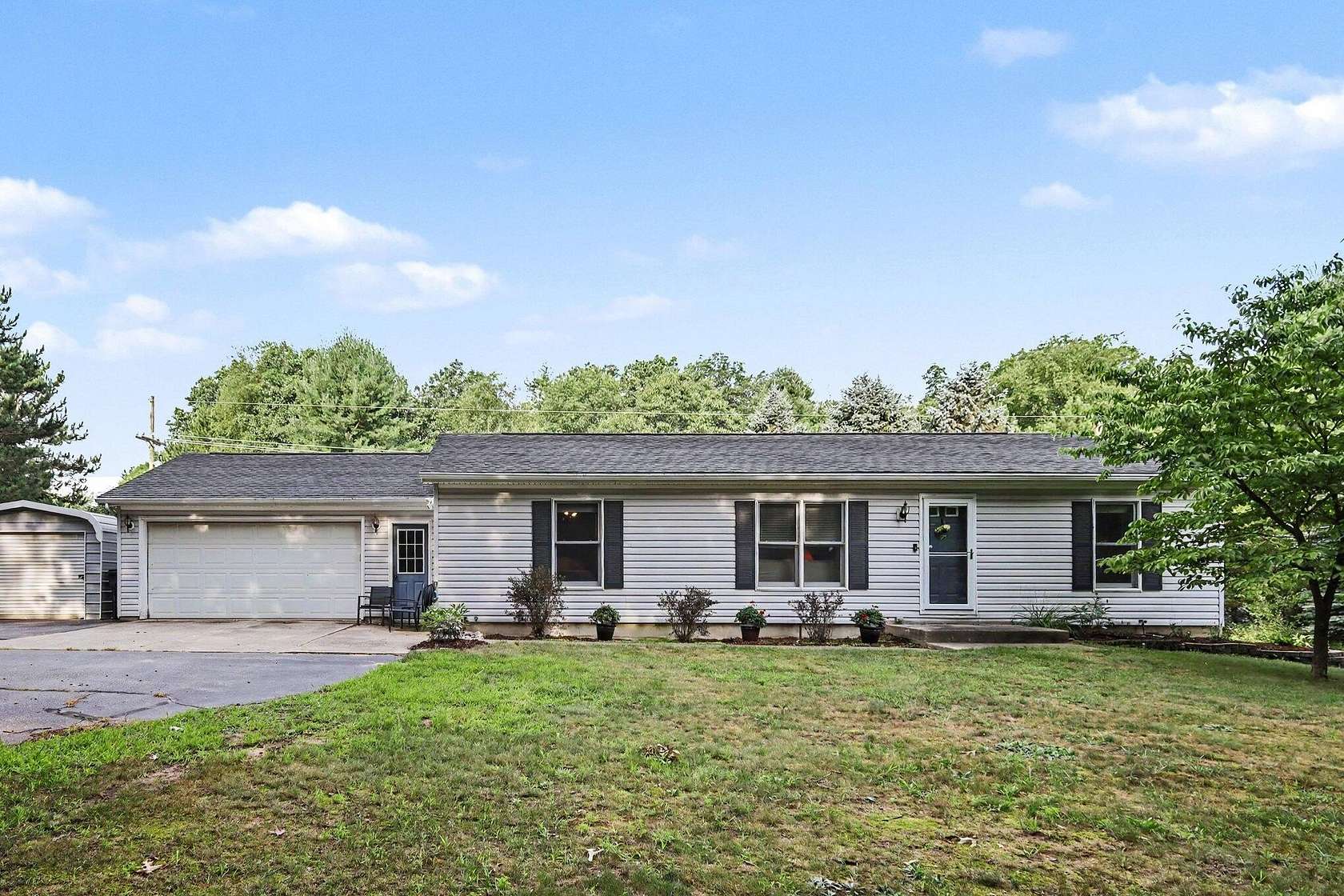 2 Acres of Land with Home for Sale in Alto, Michigan