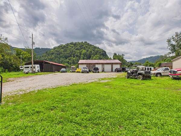 7 Acres of Land with Home for Sale in Minnie, Kentucky