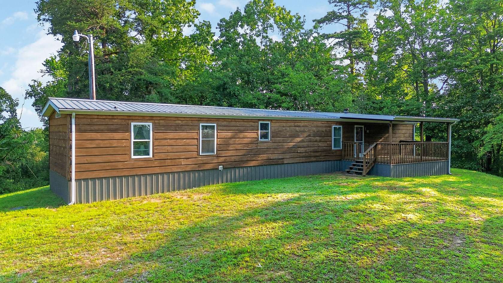 2.5 Acres of Land with Home for Sale in Stearns, Kentucky