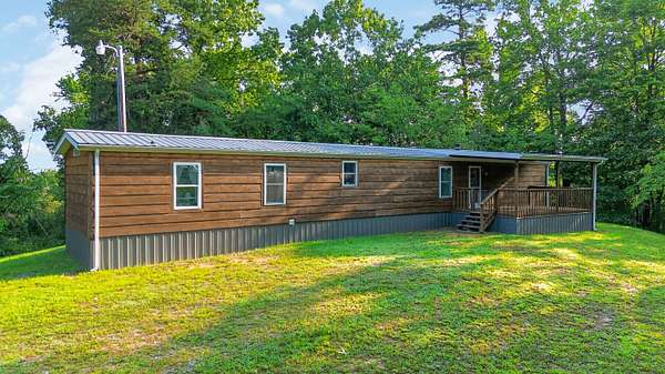 2.5 Acres of Land with Home for Sale in Stearns, Kentucky