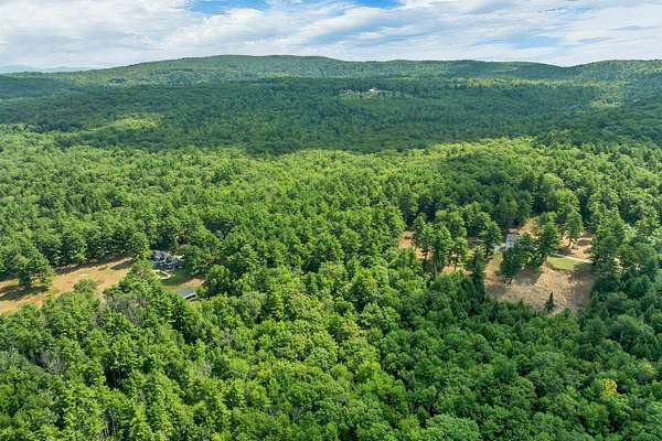 102 Acres of Recreational Land with Home for Sale in Alton, New Hampshire