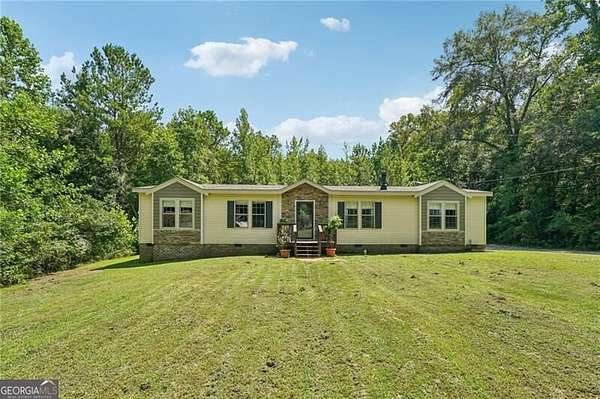 2.4 Acres of Land with Home for Sale in Ball Ground, Georgia
