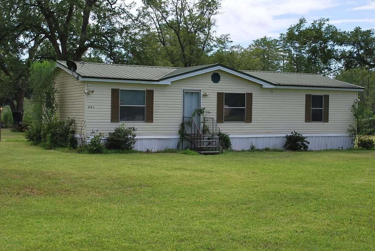 7.3 Acres of Land with Home for Sale in Ty Ty, Georgia
