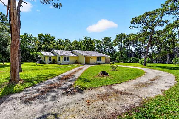 2.5 Acres of Land with Home for Sale in Jupiter, Florida
