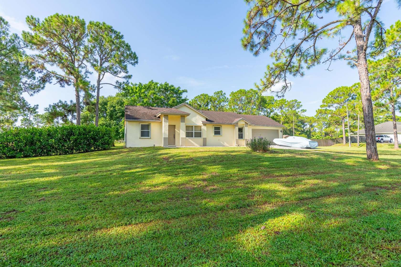 1.5 Acres of Land with Home for Sale in Loxahatchee Groves, Florida