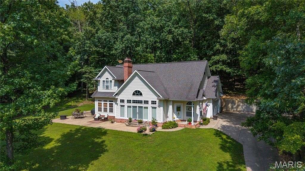 5.8 Acres of Land with Home for Sale in Jackson, Missouri