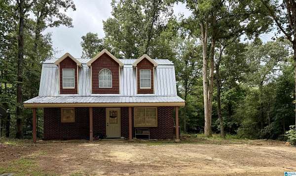 2.3 Acres of Land with Home for Sale in Pell City, Alabama
