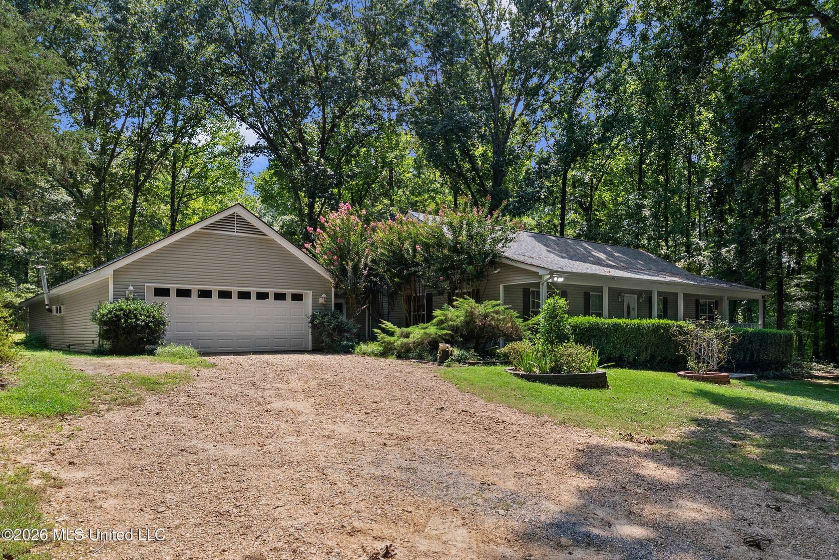 10.7 Acres of Land with Home for Sale in Coldwater, Mississippi