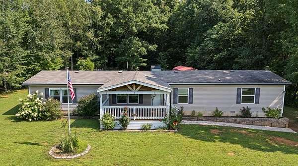 2.47 Acres of Land with Home for Sale in Baxter, Tennessee