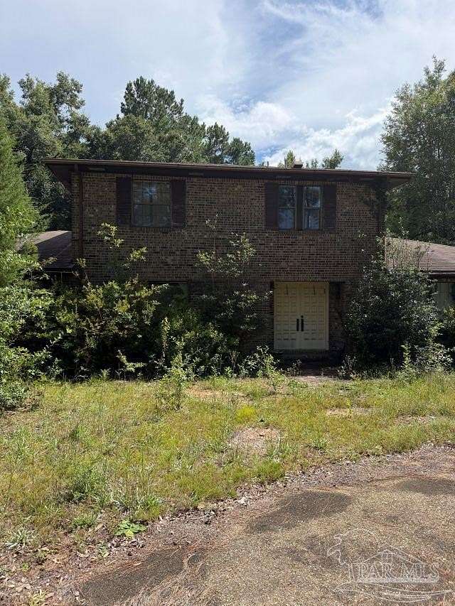 5 Acres of Land with Home for Sale in Pace, Florida