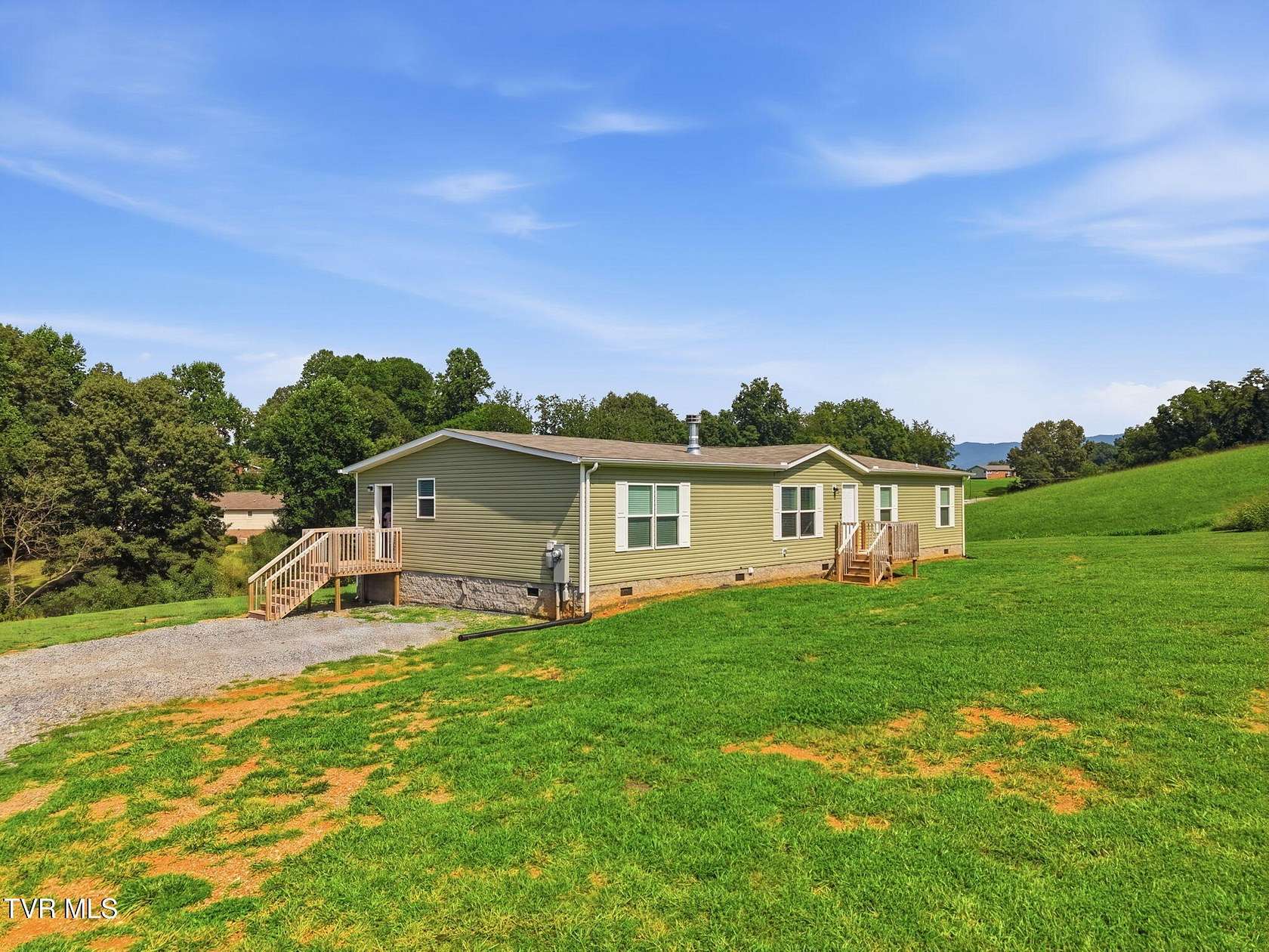 9.9 Acres of Land with Home for Sale in Bluff City, Tennessee