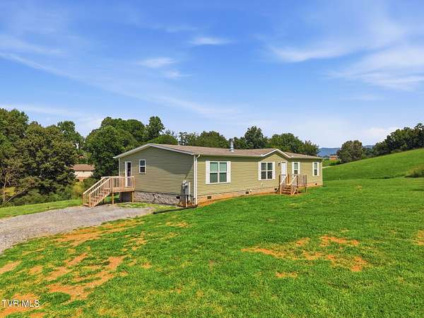 9.9 Acres of Land with Home for Sale in Bluff City, Tennessee