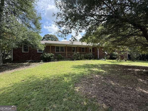 5.28 Acres of Land with Home for Sale in Douglasville, Georgia