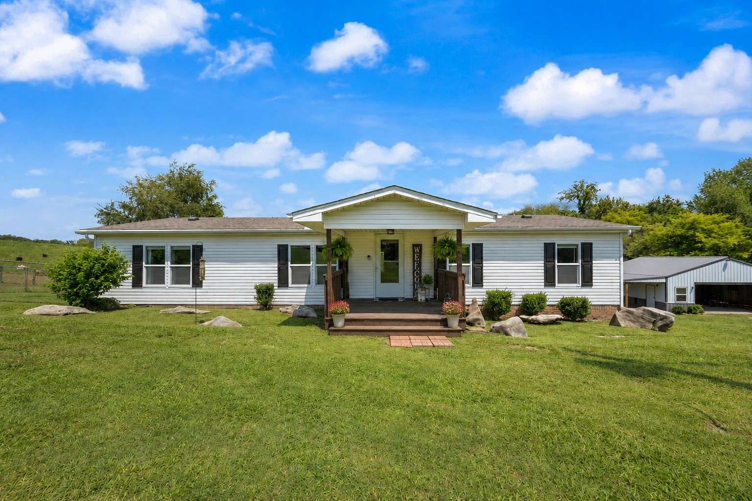 5 Acres of Land with Home for Sale in Adams, Tennessee