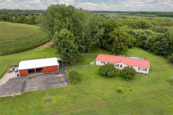 43 Acres of Recreational Land with Home for Sale in Agency, Missouri