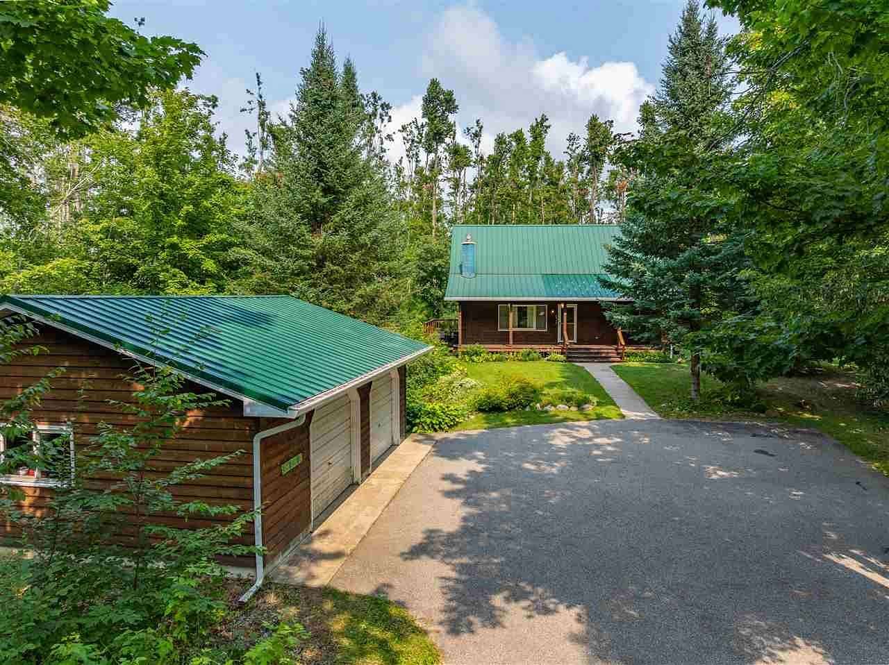 14.8 Acres of Land with Home for Sale in Elmira, Michigan