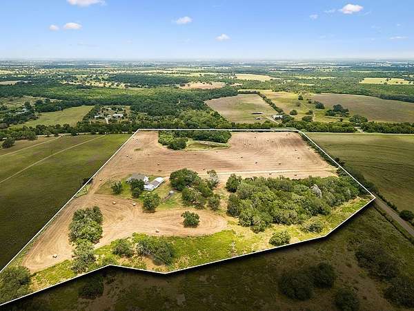 18.8 Acres of Recreational Land with Home for Sale in Paige, Texas