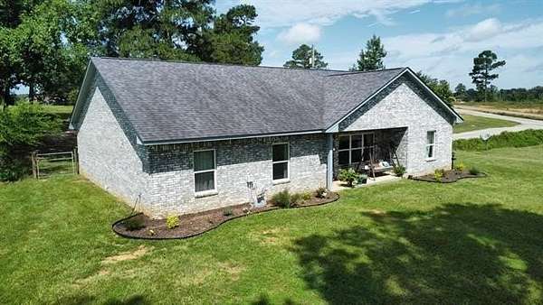 5 Acres of Land with Home for Sale in Gilmer, Texas