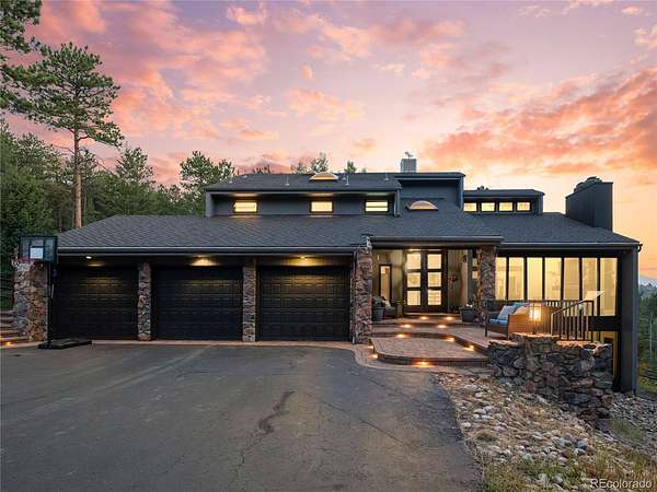 5 Acres of Land with Home for Sale in Evergreen, Colorado