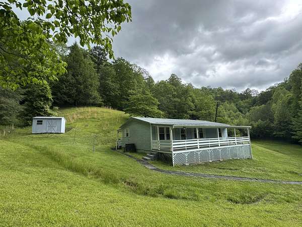 10 Acres of Land with Home for Sale in Calvin, Kentucky