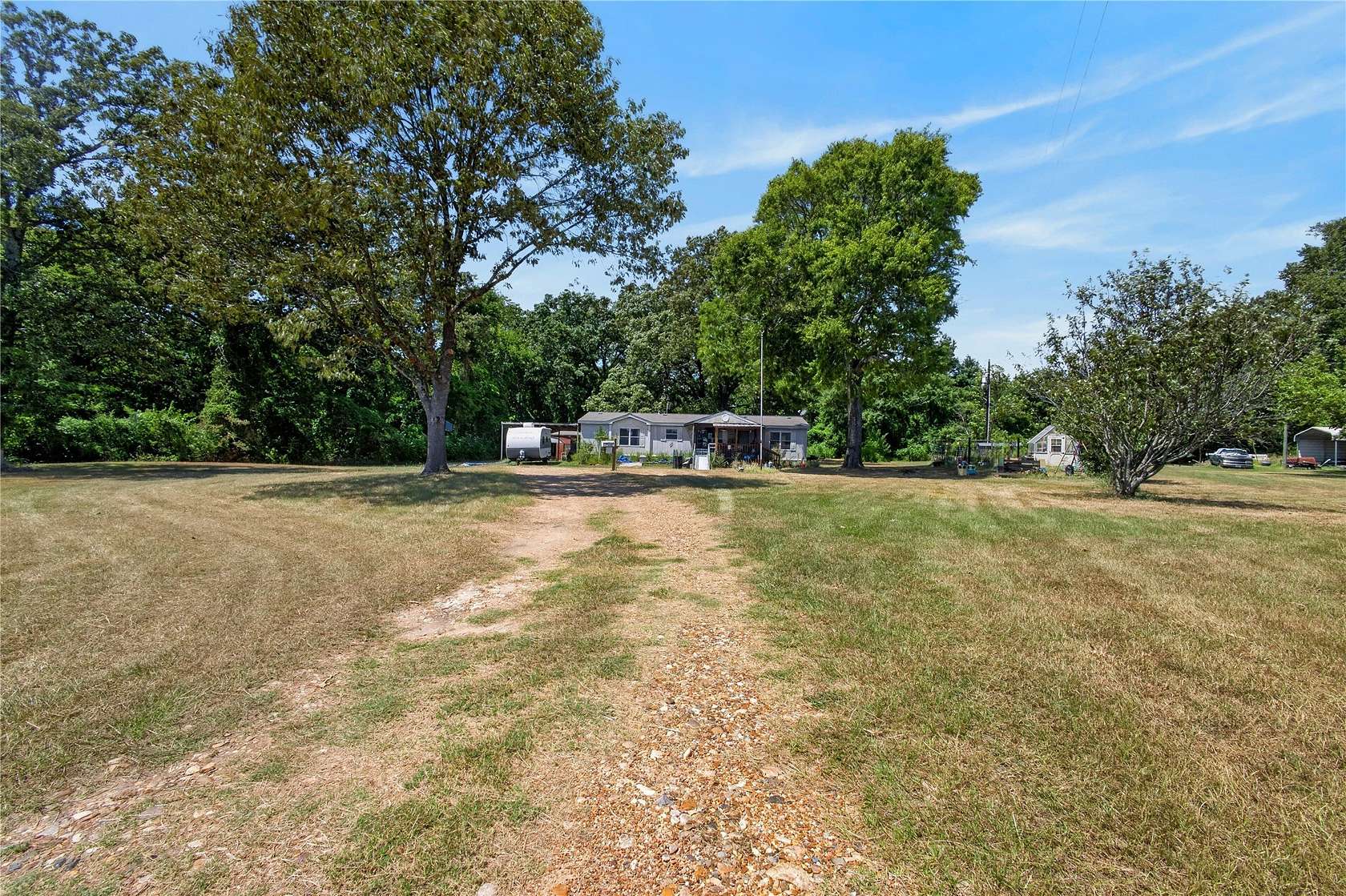 5 Acres of Land with Home for Sale in New Boston, Texas