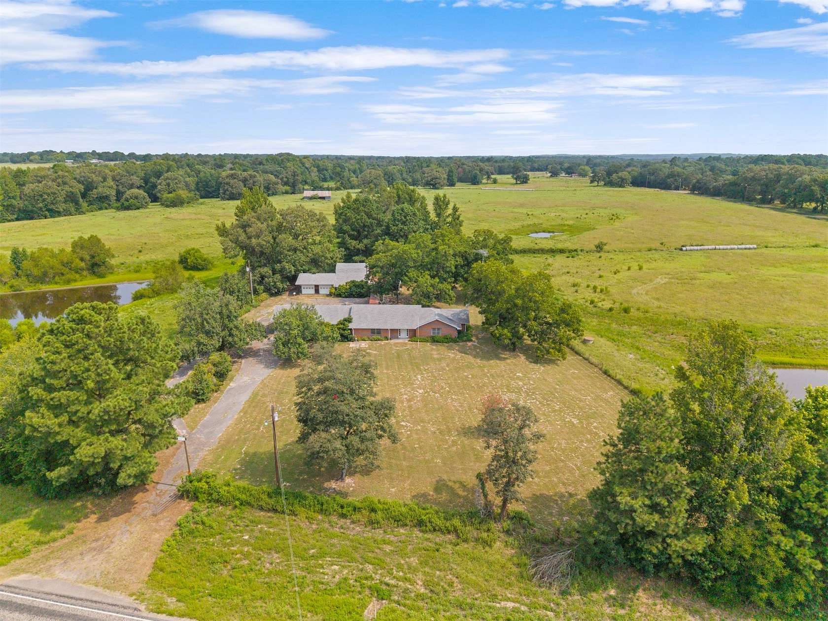 94.1 Acres of Land with Home for Sale in Quitman, Texas